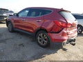2015 Hyundai Santa Fe — photo 3 of 11 | VIN 5XYZTDLB3FG280258