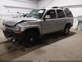 2005 Chevrolet Tahoe — photo 2 of 11 | VIN 1GNEK13T75R272566