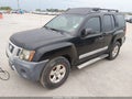 2011 Nissan Xterra — photo 2 of 11 | VIN 5N1AN0NU9BC514816
