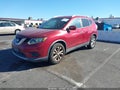 2014 Nissan Rogue — photo 2 of 11 | VIN 5N1AT2MT8EC823630