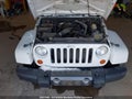 2011 Jeep Wrangler — photo 9 of 16 | VIN 1J4AA2D18BL614774