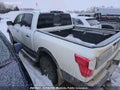 2018 Nissan Titan — photo 4 of 11 | VIN 1N6AA1E5XJN534085
