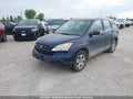 2009 Honda CR-V — photo 2 of 16 | VIN 5J6RE38389L800396