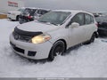 2009 Nissan Versa — photo 2 of 16 | VIN 3N1BC13E49L466109