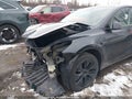 2024 Tesla Model Y — photo 6 of 18 | VIN 7SAYGDEE1RF203474
