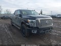 2016 Nissan Titan — photo 1 of 20 | VIN 1N6BA1F4XGN502885