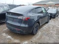 2025 Tesla Model Y — photo 4 of 17 | VIN 7SAYGDED5SF264629