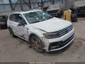 2018 Volkswagen Tiguan — photo 1 of 18 | VIN 3VV4B7AX9JM179719
