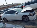 2018 Acura TLX — photo 14 of 18 | VIN 19UUB3F74JA801593