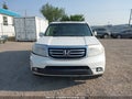 2013 Honda Pilot — photo 12 of 17 | VIN 5FNYF4H95DB502344