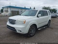 2013 Honda Pilot — photo 2 of 17 | VIN 5FNYF4H95DB502344