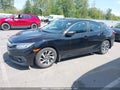2018 Honda Civic — photo 14 of 19 | VIN 2HGFC2F6XJH040741