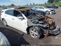 2013 Nissan Altima — photo 12 of 15 | VIN 1N4AL3AP0DN506189