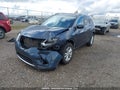 2014 Nissan Rogue — photo 2 of 20 | VIN 5N1AT2MM0EC770334
