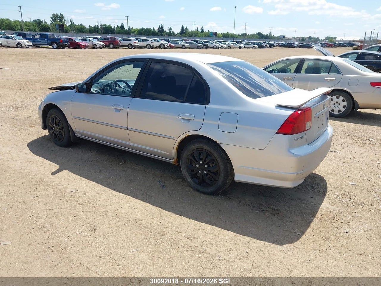 2HGES16664H907744 · 2004 HONDA CIVIC LX · 3/12
