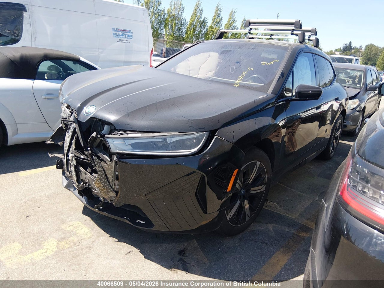 WB523CF01RCP18477 · 2024 BMW IX XDRIVE50 · 2/12