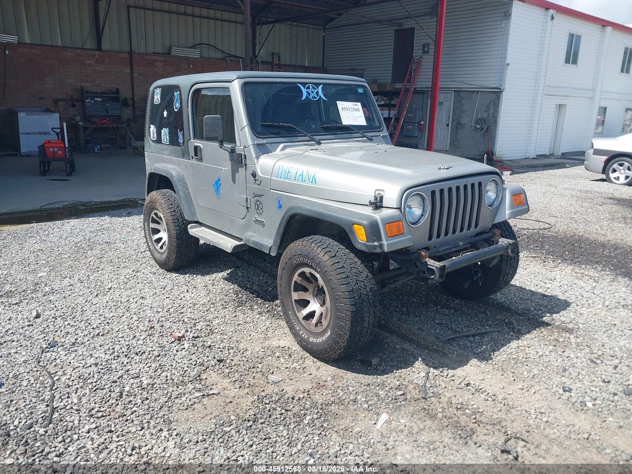 1J4FA49SX2P****** · 2002 JEEP WRANGLER SPORT