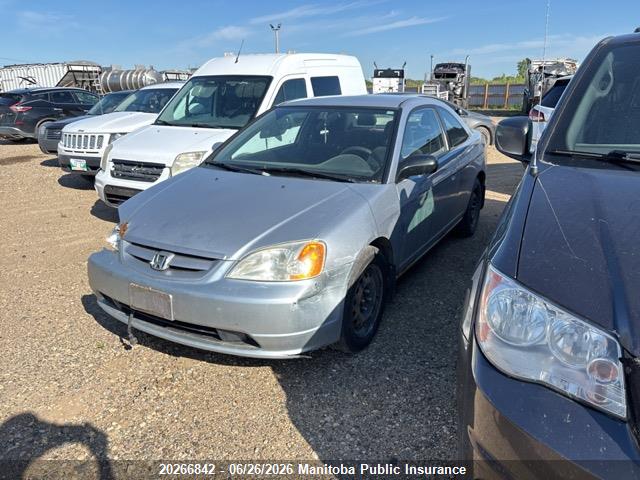 1HGEM21563L800323 · 2003 HONDA CIVIC LX · 2/12